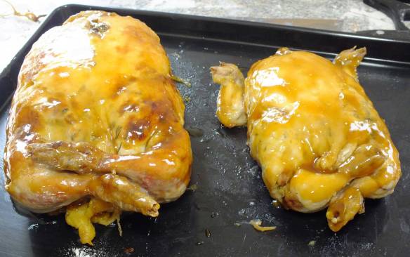 The guinea fowl beside its much smaller Poussin. All glazed being chilled for tomorrows picnic at Penhurst.
