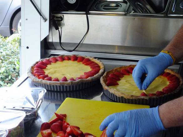 preparing strawberry tart for the party